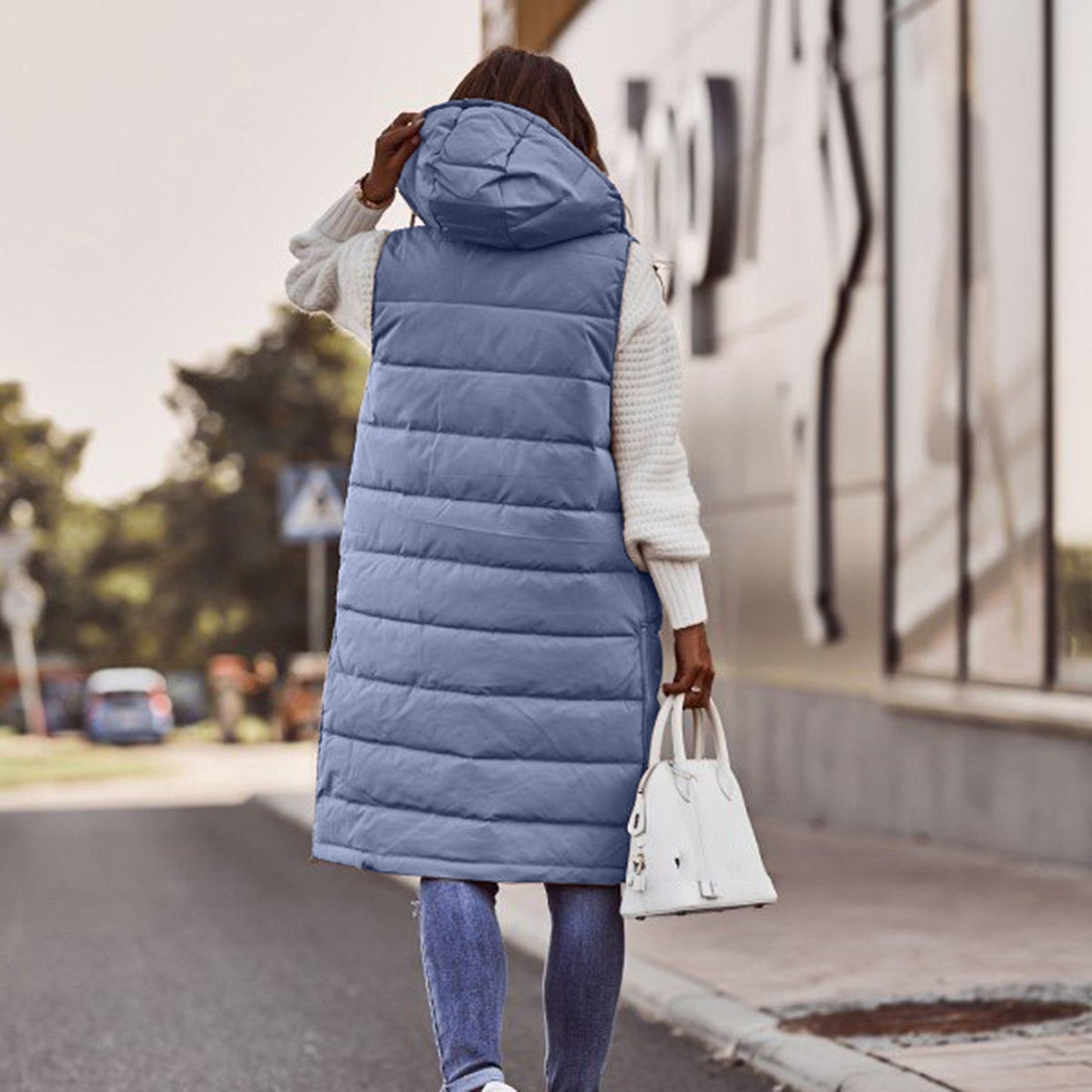 Lange Damen Steppweste mit Kapuze - Winterjacke